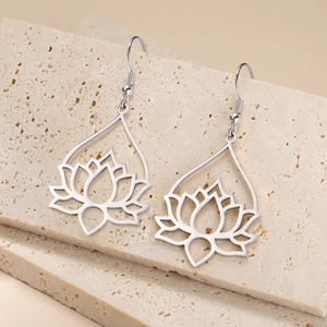 Elegant silver hollow lotus drop earrings featuring a stainless steel water drop frame