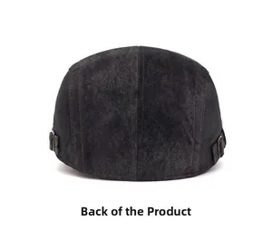 Detail view of adjustable metal buckle and stitching on black vintage newsboy hat back