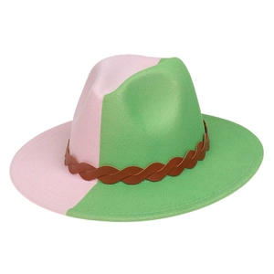 Detail of pink and green patchwork fedora hat with brown woven leather decorative belt