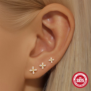 S925 sterling silver four-leaf clover stud earrings with white zircon on ear model