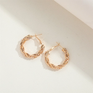 Exaggerated 14K gold plated twisted hoop earrings with sparkling zircon stones