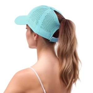 Detail of light blue quick-dry ponytail cap showing breathable holes and hair opening