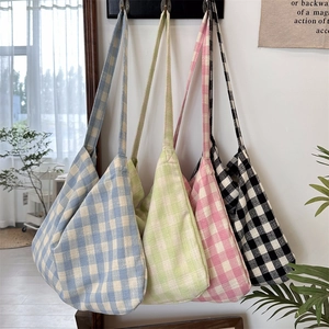 Detailed view of casual vichy plaid canvas tote bags in four pastel color options
