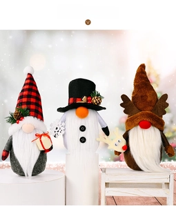 Three Christmas gnomes featuring plaid hats and reindeer antlers on white studio pedestals