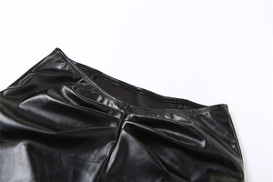 Detailed close-up of the black PU leather waist tailoring and ruching textures