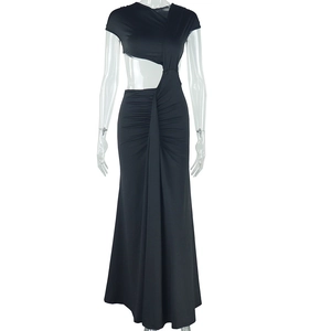 Detail of elegant black one-shoulder dress with side cutout and draped ruched waist