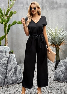 Fashionable black V-neck short sleeve jumpsuit with waist tie and wide leg design