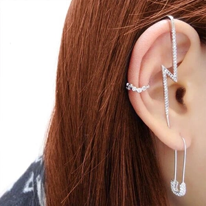 Detailed view of silver lightning bolt ear cuff and pin earring with cubic zirconia