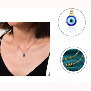 Detail showing 8mm evil eye pendant on a strong rolo chain with 18+2 inch length