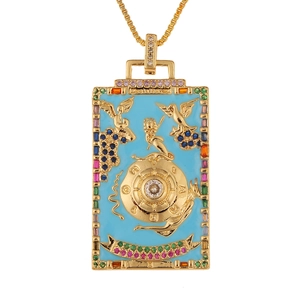 Detail of tarot card pendant with blue enamel wheel of fortune and colorful zircon stones