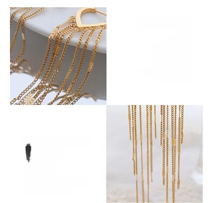Detail of 18K gold plated titanium steel fringe earrings showing delicate chain texture