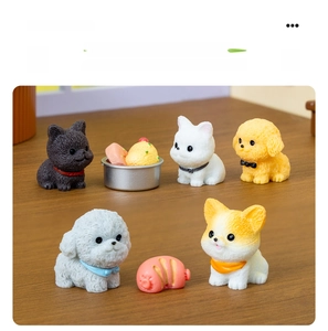 Detailed view of various cute resin puppy figurines with bibs for DIY micro landscapes