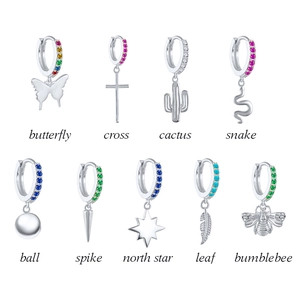 Detailed grid of silver S925 earrings with butterfly, snake and cross charms set