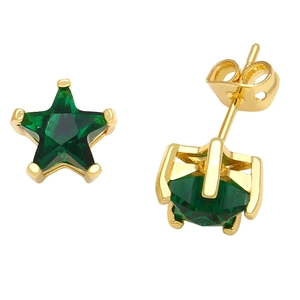 Macro shot of green star earrings with gold plating and cubic zirconia in prong setting