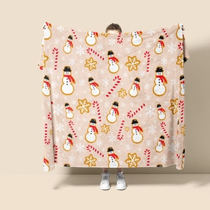 Detail view of snowman flannel blanket featuring soft texture and festive Christmas prints