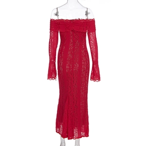 Detail of red floral lace fabric with flared sleeves and off-the-shoulder neckline