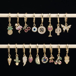 Golden drop earrings set featuring diverse zircon charms like flamingo and butterfly shapes