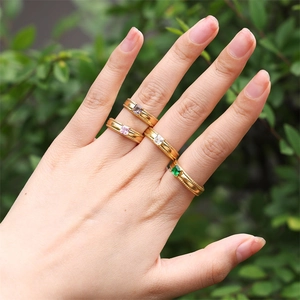 18k gold plated stainless steel rings set with colorful zircon stones on woman hand