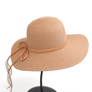 Summer khaki wide brim straw sun hat with decorative braided band and bow design