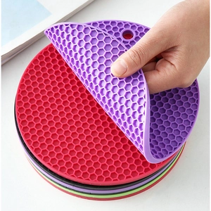 Flexible honeycomb silicone coasters in multiple colors with non-slip texture design