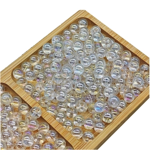 10mm iridescent AB plated glass beads for DIY jewelry making in a bamboo tray