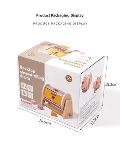 Detailed view of the wooden rolling drum toy packaging box with dimensions and safety labels