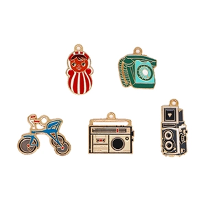 Retro vintage DIY alloy charms featuring radio and phone designs on white background