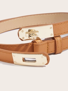 Detail of light brown Saffiano leather belt featuring a classic gold twist lock buckle