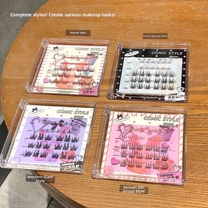 Close-up of four comic style false eyelashes sets in clear acrylic packaging