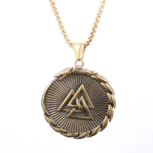 Detailed view of Nordic Viking Valknut pendant with antique gold finish on square chain