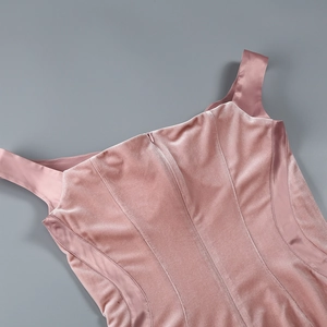 Detail of pink velvet dress showing back zipper and smooth satin shoulder straps