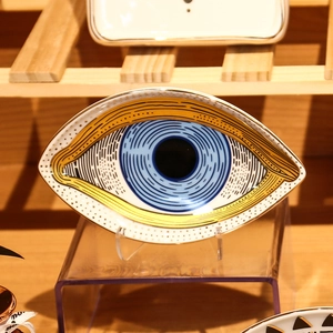 Artistieke blauwe keramische ovale evil eye sieradenschaal met gouden rand