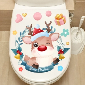 Detailed view of Merry Christmas reindeer wall sticker on a white toilet lid