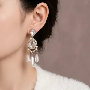 Vintage water drop pearl earrings with zircon crystals in gold plated royal palace style