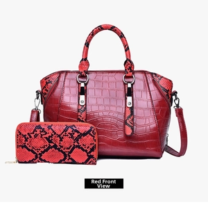 Front view of red faux leather crocodile handbag and snakeskin wallet set
