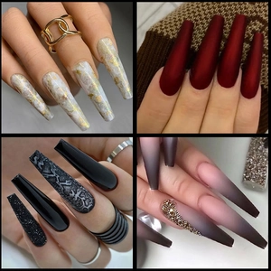 Extra long coffin false nails with marble texture, matte red, and rhinestone accents