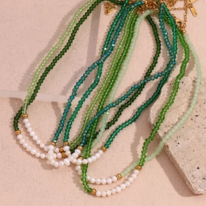 Green crystal and freshwater pearl beaded necklace with gold stainless steel beads