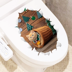 3D Christmas cat wall sticker showing a ginger cat in a basket on a toilet lid