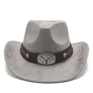 Detail of silver bull head buckle and turquoise studs on grey suede cowboy hat band
