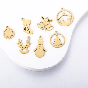 Golden stainless steel Christmas pendants set featuring reindeer, snowman, and tree shapes