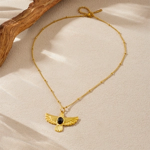 Gold eagle pendant necklace with black oval gemstone on minimalist bead chain