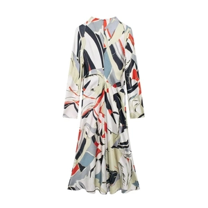 Detailed back view of a satin midi dress showing invisible zipper and abstract print