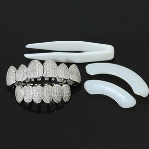 Silver micro-pocked zircon hip hop grillz set with tweezers and fixing silicone bars