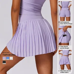 Jupe de sport plissée violette à taille haute avec poches latérales pour téléphone