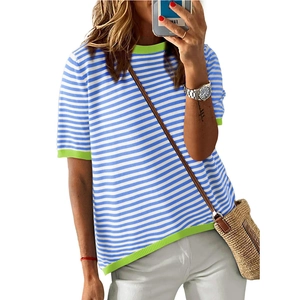 Women stripe knit sweater with bright green contrast trim in a casual short sleeve style