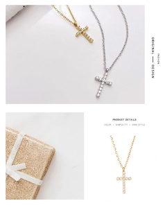 Detail of cross pendant necklace in gold and silver finish with elegant gift box