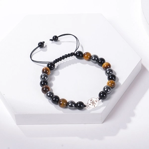 Pulsera de piedras naturales ojo de tigre y hematita con colgante de brújula plateado