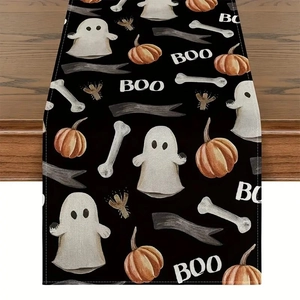 Halloween table runner with pumpkins and ghosts on a rustic wooden background