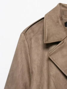 Detail of lapel and stitching on a brown faux suede long-sleeve trench coat jacket