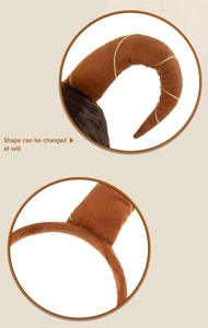 Detail of adjustable brown plush devil horns headband with gold wire spiral wrap